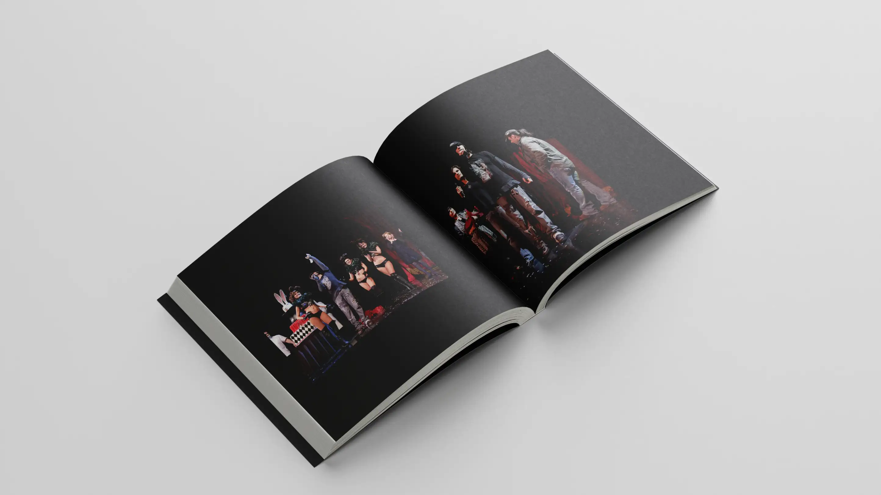 Book open to interior spread of photos from Criss Angel performance.
