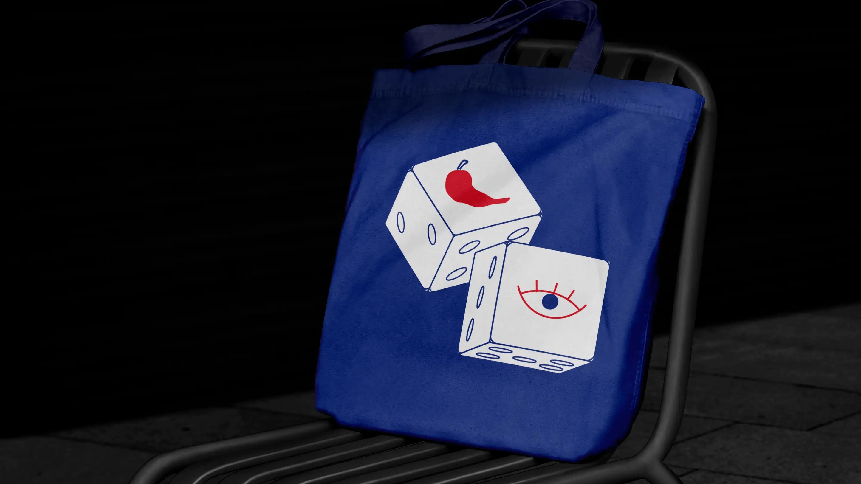 Blue tote bag design featuring Spicy Eyes dice icon.